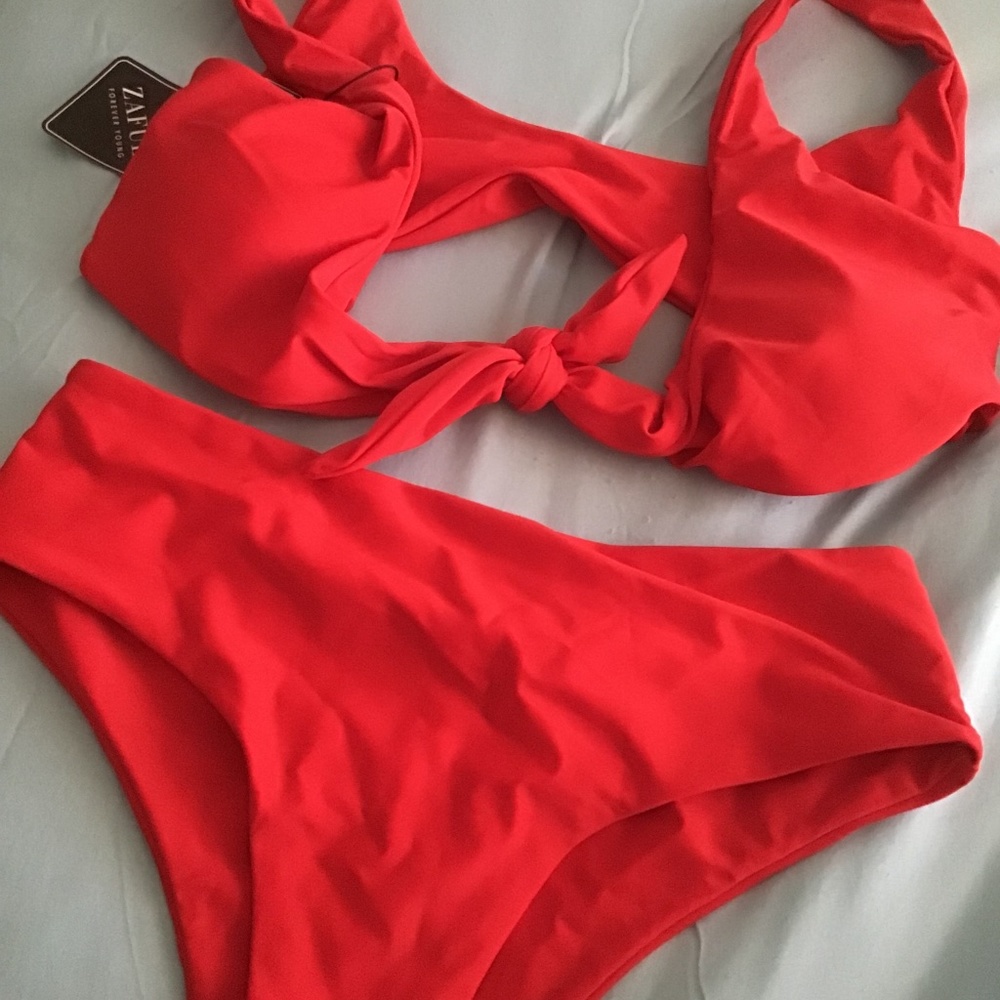 Spring break!Cute itsy bitty red bikini! Size L - NWT - a steal for the price!